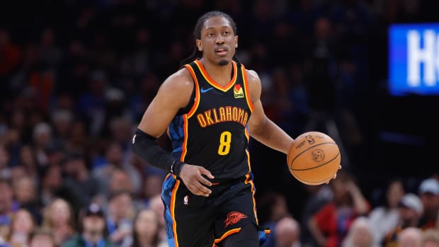 Oklahoma City, Oklahoma, USA; Oklahoma City Thunder forward Jalen Williams (8) dribbles down the court against the Denver Nuggets during the second half at Paycom Center. Mandatory Credit: Alonzo Adams-Imagn Images