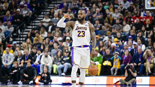 Salt Lake City, Utah, USA; Los Angeles Lakers forward LeBron James (23) dribbles the ball downcourt against the Utah Jazz during the second half at the Delta Center. Mandatory Credit: Christopher Creveling-Imagn Images