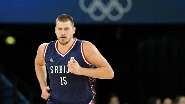Serbia power forward Nikola Jokic (15) runs up the court against Germany in the men's basketball bronze medal game during the Paris 2024 Olympic Summer Games at Accor Arena.