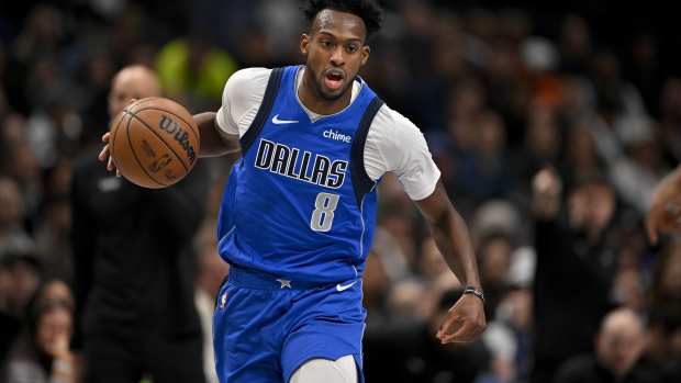 Feb 10, 2025; Dallas, Texas, USA; Dallas Mavericks forward Olivier-Maxence Prosper (8) brings the ball up court against the Sacramento Kings during the second quarter at the American Airlines Center. Mandatory Credit: Jerome Miron-Imagn Images