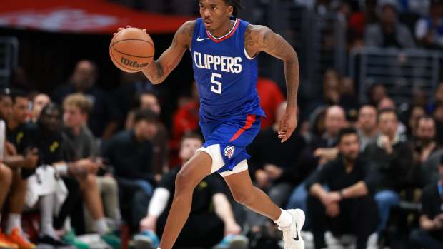 Apr 12, 2024; Los Angeles, California, USA; Los Angeles Clippers guard Bones Hyland (5) dribbles the ball during the fourth quarter against the Utah Jazz at Crypto.com Arena. Mandatory Credit: Kiyoshi Mio-Imagn Images