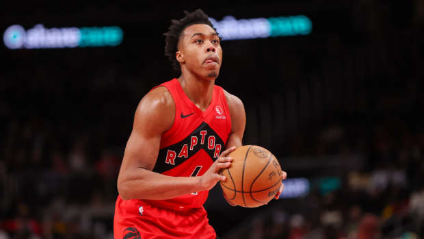 Jan 23, 2025; Atlanta, Georgia, USA; Toronto Raptors forward Scottie Barnes (4) shoots a free throw against the Atlanta Hawks in the fourth quarter at State Farm Arena. Mandatory Credit: Brett Davis-Imagn Images