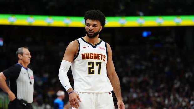 Denver Nuggets guard Jamal Murray reacts in the second quarter against the Oklahoma City Thunder at Ball Arena.