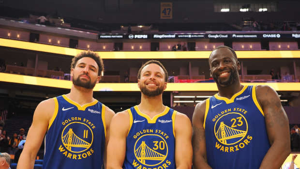 Nov 30, 2023; San Francisco, California, USA; Golden State Warriors guard Klay Thompson (11), guard Stephen Curry (30) and forward Draymond Green (23) after the game against the Los Angeles Clippers at Chase Center.