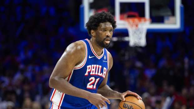 Apr 25, 2024; Philadelphia, Pennsylvania, USA; Philadelphia 76ers center Joel Embiid (21) dribbles against the New York Knicks during the second half of game three of the first round for the 2024 NBA playoffs at Wells Fargo Center.