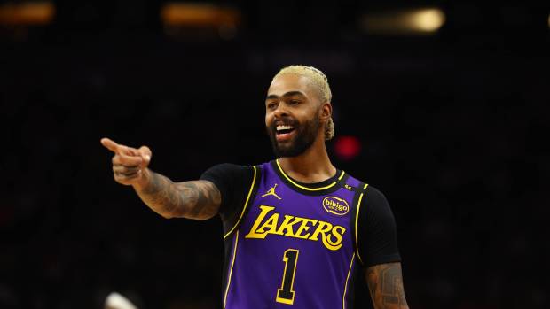 Oct 28, 2024; Phoenix, Arizona, USA; Los Angeles Lakers guard D'Angelo Russell (1) against the Phoenix Suns at Footprint Center. Mandatory Credit: Mark J. Rebilas-Imagn Images