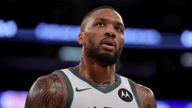 Milwaukee Bucks guard Damian Lillard (0) reacts during the second quarter against the New York Knicks at Madison Square Garden.