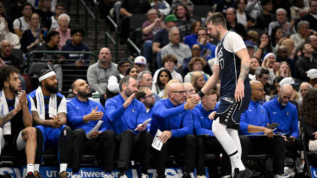 Dallas Mavericks guard Luka Doncic (77) leaves the game against the Portland Trail Blazers during the second half at the American Airlines Center. Mandatory Credit: Jerome Miron-Imagn Images