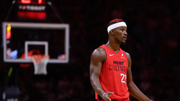 Miami Heat forward Jimmy Butler reacts against the Philadelphia 76ers during the third quarter at Kaseya Center.