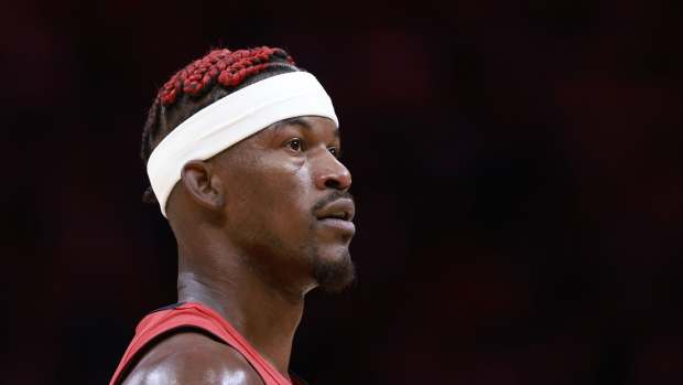 Miami Heat forward Jimmy Butler (22) stands on the court during a timeout against the Dallas Mavericks during the second half at Kaseya Center. Mandatory Credit: Rhona Wise-Imagn Images