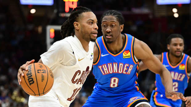 Cleveland Cavaliers guard Darius Garland (10) drives to the basket against Oklahoma City Thunder forward Jalen Williams (8) during the second half at Rocket Mortgage FieldHouse. Mandatory Credit: Ken Blaze-Imagn Images