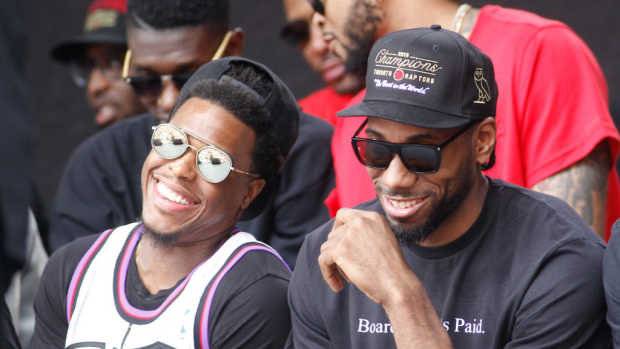 Toronto Raptors guard Kyle Lowry and forward Kawhi Leonard during a rally at Toronto City Hall.