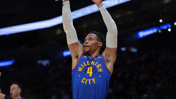 Denver Nuggets guard Russell Westbrook (4) shoots the basketball against the Miami Heat during the first quarter at Kaseya Center. Mandatory Credit: Sam Navarro-Imagn Images