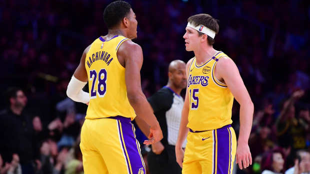 January 15, 2025; Los Angeles, California, USA; Los Angeles Lakers forward Rui Hachimura (28) and guard Austin Reaves (15) celebrate during the second half at Crypto.com Arena. Mandatory Credit: Gary A. Vasquez-Imagn Images  