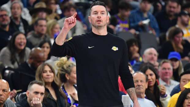 Los Angeles Lakers head coach JJ Redick watches game action against the Los Angeles Clippers during the first half at Intuit Dome.