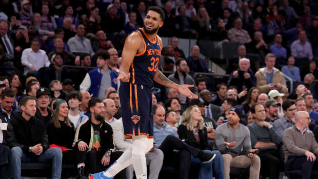 New York Knicks center Karl-Anthony Towns (32) reacts during the fourth quarter against the Denver Nuggets at Madison Square Garden. Mandatory Credit: Brad Penner-Imagn Images