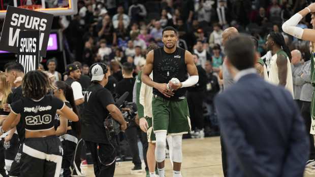 Milwaukee Bucks forward Giannis Antetokounmpo (34) walks off the court after a defeat against the San Antonio Spurs at Frost Bank Center.