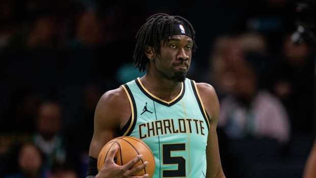 Charlotte Hornets center Mark Williams (5) holds the ball against the Portland Trail Blazers during the second quarter at Spectrum Center. Mandatory Credit: Scott Kinser-Imagn Images