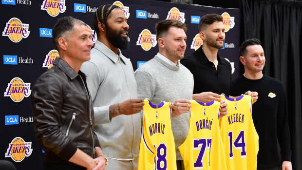 Los Angeles Lakers guard Luka Doncic, forward Max Kleber, forward Markieff Morris, vice president of basketball operations Rob Pelinka and head coach JJ Redick pose for photos at UCLA Health Training Center. Mandatory Credit: Gary A. Vasquez-Imagn Images