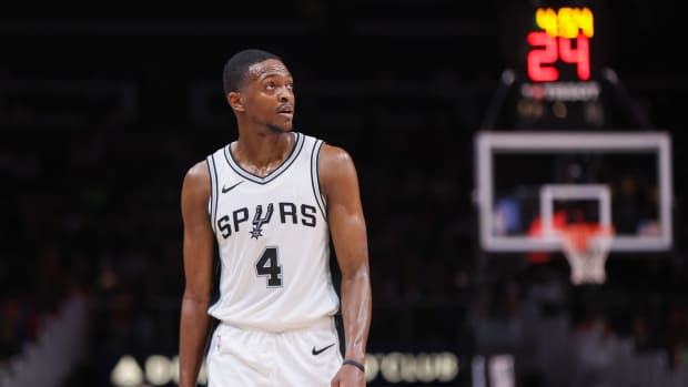 Feb 5, 2025; Atlanta, Georgia, USA; San Antonio Spurs guard De'Aaron Fox (4) in action against the Atlanta Hawks in the third quarter at State Farm Arena. Mandatory Credit: Brett Davis-Imagn Images  