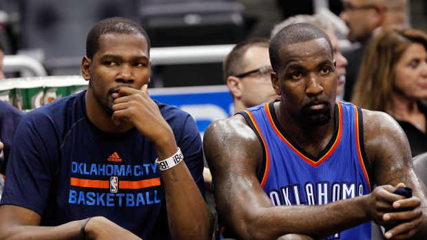 Oklahoma City Thunder forward Kevin Durant (35) and center Kendrick Perkins (5) look on from the bench against the Orlando Magic during the second half at Amway Center. Oklahoma City Thunder defeated the Orlando Magic 127-99. Mandatory Credit: Kim Klement-Imagn Images