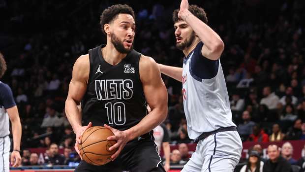  Brooklyn Nets guard Ben Simmons (10) looks to post up against Washington Wizards forward Tristan Vukcevic (00) in the third quarter at Barclays Center. Mandatory Credit: Wendell Cruz-Imagn Images