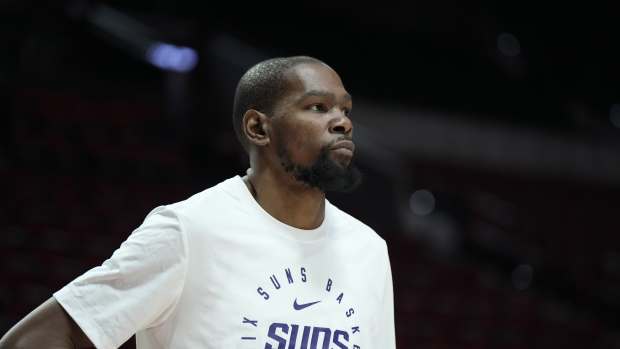 Phoenix Suns power forward Kevin Durant (35) looks on during warm ups before the game against the Portland Trail Blazers at Moda Center. Mandatory Credit: Soobum Im-Imagn Images