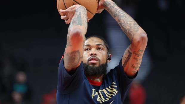 New Orleans Pelicans forward Brandon Ingram (14) shoots a free throw before playing in a game against the Portland Trail Blazers at Moda Center.