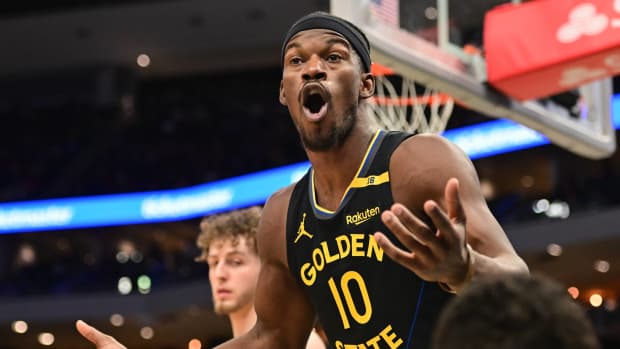 Golden State Warriors forward Jimmy Butler (10) reacts in the fourth quarter against the Milwaukee Bucks at Fiserv Forum.