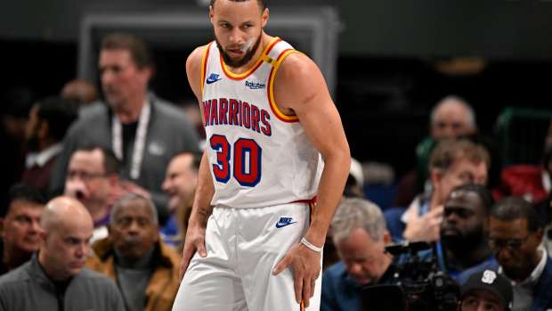 Feb 12, 2025; Dallas, Texas, USA; Golden State Warriors guard Stephen Curry (30) looks on during the second quarter against the Dallas Mavericks at the American Airlines Center. Mandatory Credit: Jerome Miron-Imagn Images  