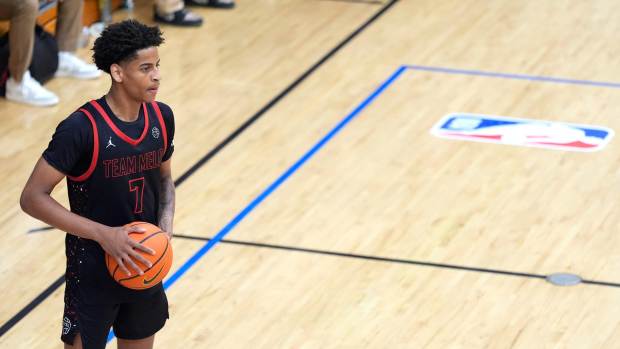 Team Melo's Kiyan Anthony (7), son of NBA star Carmelo Anthony, looks to pass during the Team Melo and Georgia Stars game at the Nike Peach Jam at Riverview Park Activities Center. The Georgia Stars won 64-63.