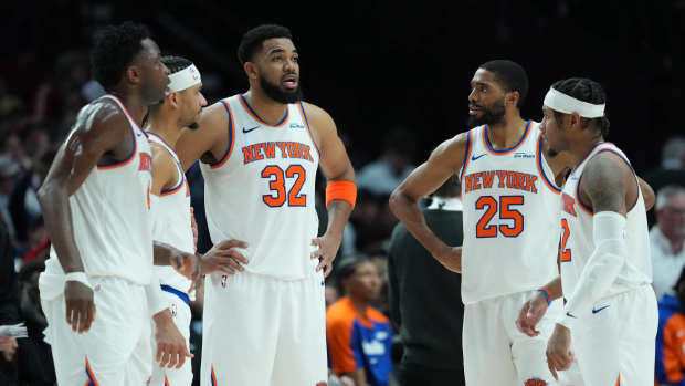 New York Knicks center Karl-Anthony Towns (32) talks to his teammates during the second half against the Portland Trail Blazers at Moda Center.