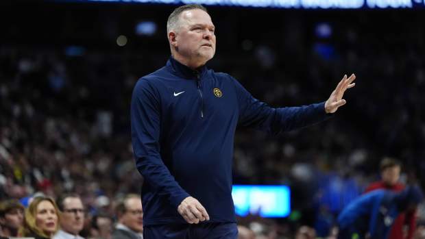 Mar 12, 2025; Denver, Colorado, USA; Denver Nuggets head coach Michael Malone during the second quarter against the Minnesota Timberwolves at Ball Arena. Mandatory Credit- Ron Chenoy-Imagn Images