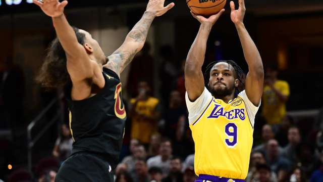 Oct 30, 2024; Cleveland, Ohio, USA; Los Angeles Lakers guard Bronny James (9) shoots over the defense of Cleveland Cavaliers forward Jaylon Tyson (24) during the second half at Rocket Mortgage FieldHouse.