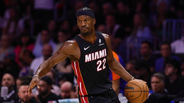 Oct 30, 2024; Miami, Florida, USA; Miami Heat forward Jimmy Butler (22) dribbles the basketball against the New York Knicks during the second quarter at Kaseya Center. Mandatory Credit: Sam Navarro-Imagn Images 