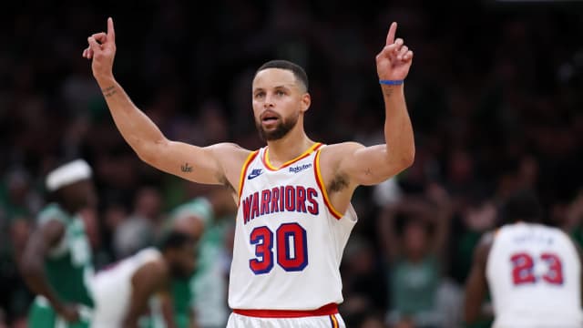 Golden State Warriors guard Stephen Curry (30) celebrates during the second half against the Boston Celtics at TD Garden. Mandatory Credit: Paul Rutherford-Imagn Images