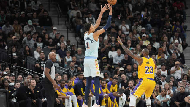 San Antonio Spurs center Victor Wembanyama (1) shoots over Los Angeles Lakers forward LeBron James (23) in the second half at Frost Bank Center.