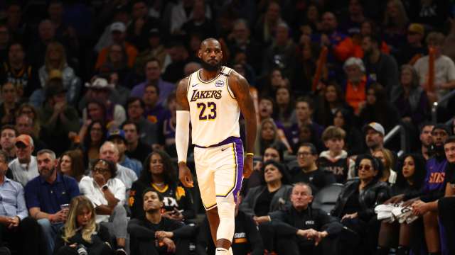 Nov 26, 2024; Phoenix, Arizona, USA; Los Angeles Lakers forward LeBron James (23) against the Phoenix Suns during an NBA Cup game at Footprint Center. Mandatory Credit: Mark J. Rebilas-Imagn Images