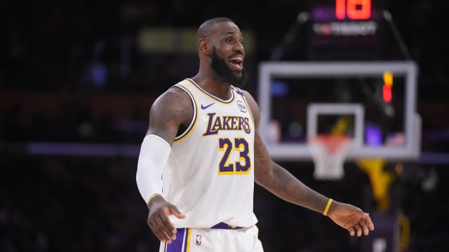 Los Angeles Lakers forward LeBron James (23) reacts in the first half against the Memphis Grizzlies at Crypto.com Arena. Mandatory Credit: Kirby Lee-Imagn Images