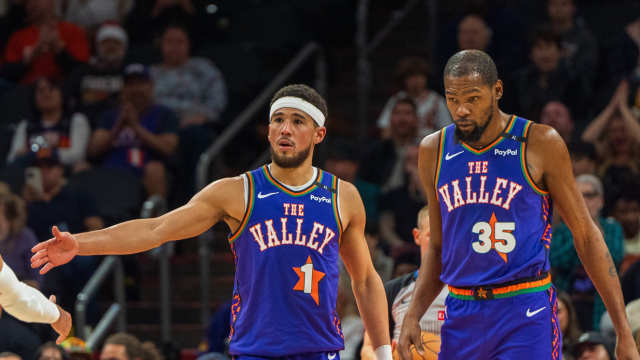 Phoenix Suns guard Devin Booker (1) and forward Kevin Durant (35) react after a time out in the second half during a game against the Portland Trail Blazers at Footprint Center. Mandatory Credit: Allan Henry-Imagn Images