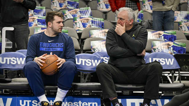 Dallas Mavericks guard Luka Doncic (left) talks with his father Sasa Doncic (right) before the game between the Dallas Mavericks and the Washington Wizards at the American Airlines Center. Mandatory Credit: Jerome Miron-Imagn Images