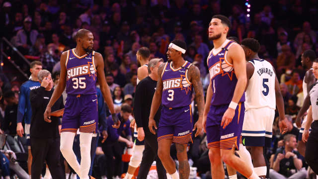 Phoenix Suns forward Kevin Durant (35) with guard Bradley Beal (3) and Devin Booker (1) against the Minnesota Timberwolves at Footprint Center. Mandatory Credit: Mark J. Rebilas-Imagn Images
