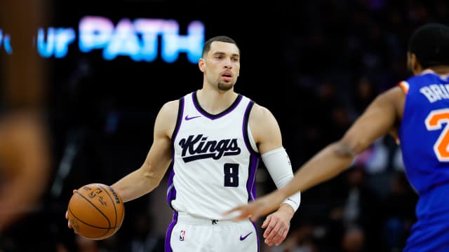 Mar 10, 2025; Sacramento, California, USA; Sacramento Kings guard Zach LaVine (8) dribbles the ball up the court against the New York Knicks during the third quarter at Golden 1 Center. Mandatory Credit: Sergio Estrada-Imagn Images  