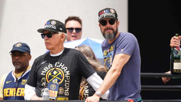 Denver, CO, USA; Denver Nuggets owner Stan Kroenke (left) and president Josh Kroenke (right) during the championship parade after the Denver Nuggets won the 2023 NBA Finals. Mandatory Credit: Ron Chenoy-Imagn Images