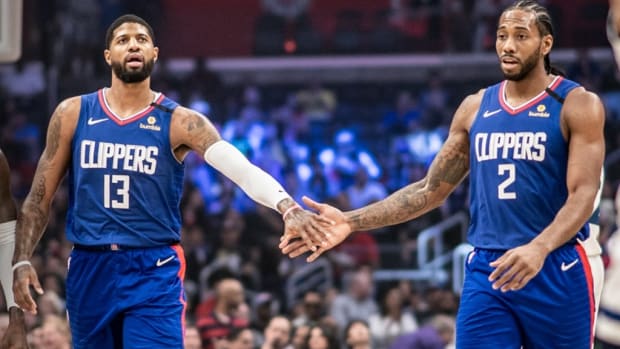 The Size Difference Between Kawhi Leonard And Paul George s Hands