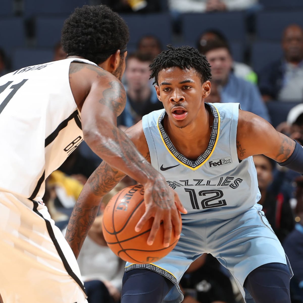 Ja Morant Pokes Fun At Kyrie Irving After Wearing His Shoes On
