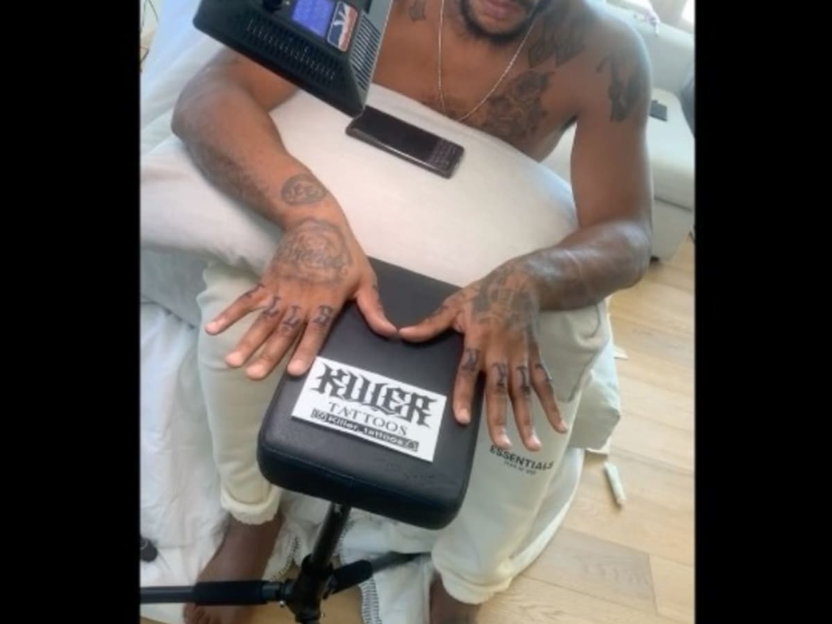 Derrick rose on sale hand tattoo