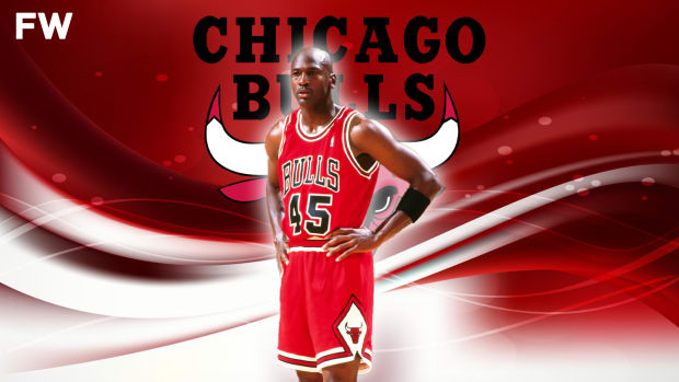 Download Michael Jordan in His Iconic Bulls Jersey Wallpaper