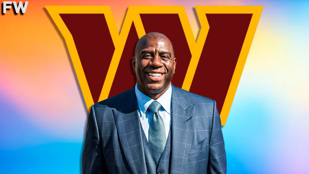 Magic Johnson meets with Washington Commanders players for the