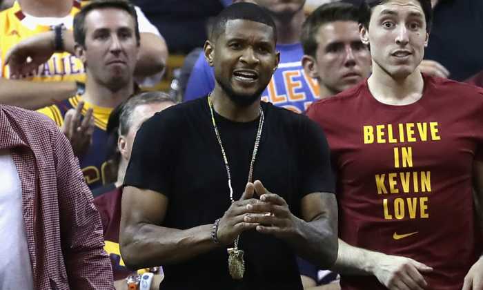 CLEVELAND, OH - JUNE 10: Recording artist Usher attends Game 4 of the 2016 NBA Finals between the Golden State Warriors and the Cleveland Cavaliers at Quicken Loans Arena on June 10, 2016 in Cleveland, Ohio. NOTE TO USER: User expressly acknowledges and agrees that, by downloading and or using this photograph, User is consenting to the terms and conditions of the Getty Images License Agreement. (Photo by Ronald Martinez/Getty Images) ORG XMIT: 643779587 ORIG FILE ID: 539322414